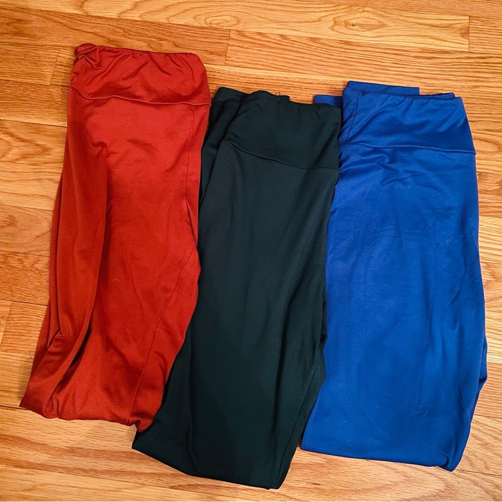 Luluroe One Size Fits all leggings. Burnt Orange, Hunter Green and Blue